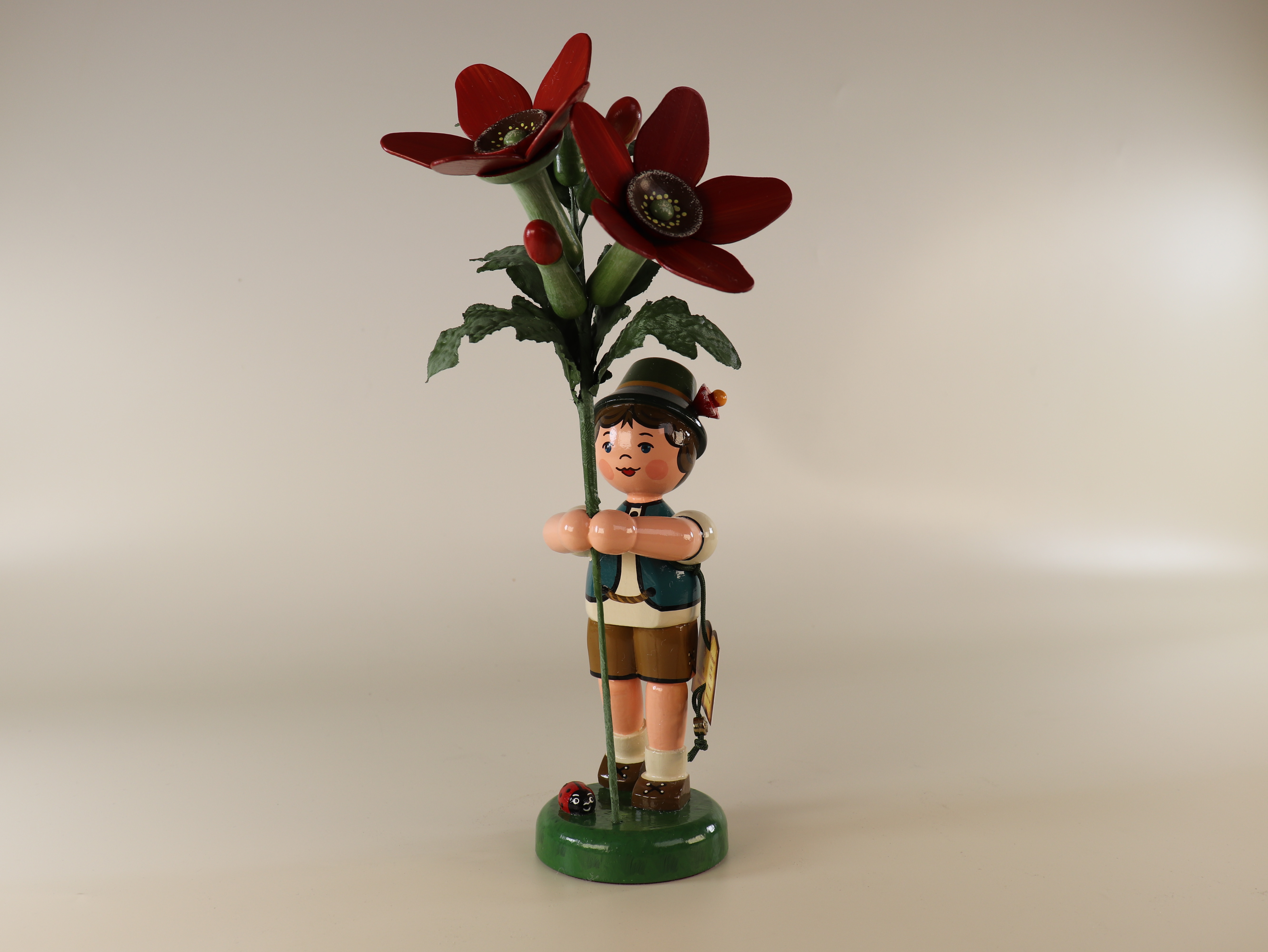 Tischdeko Blumenkind Junge mit Tabak