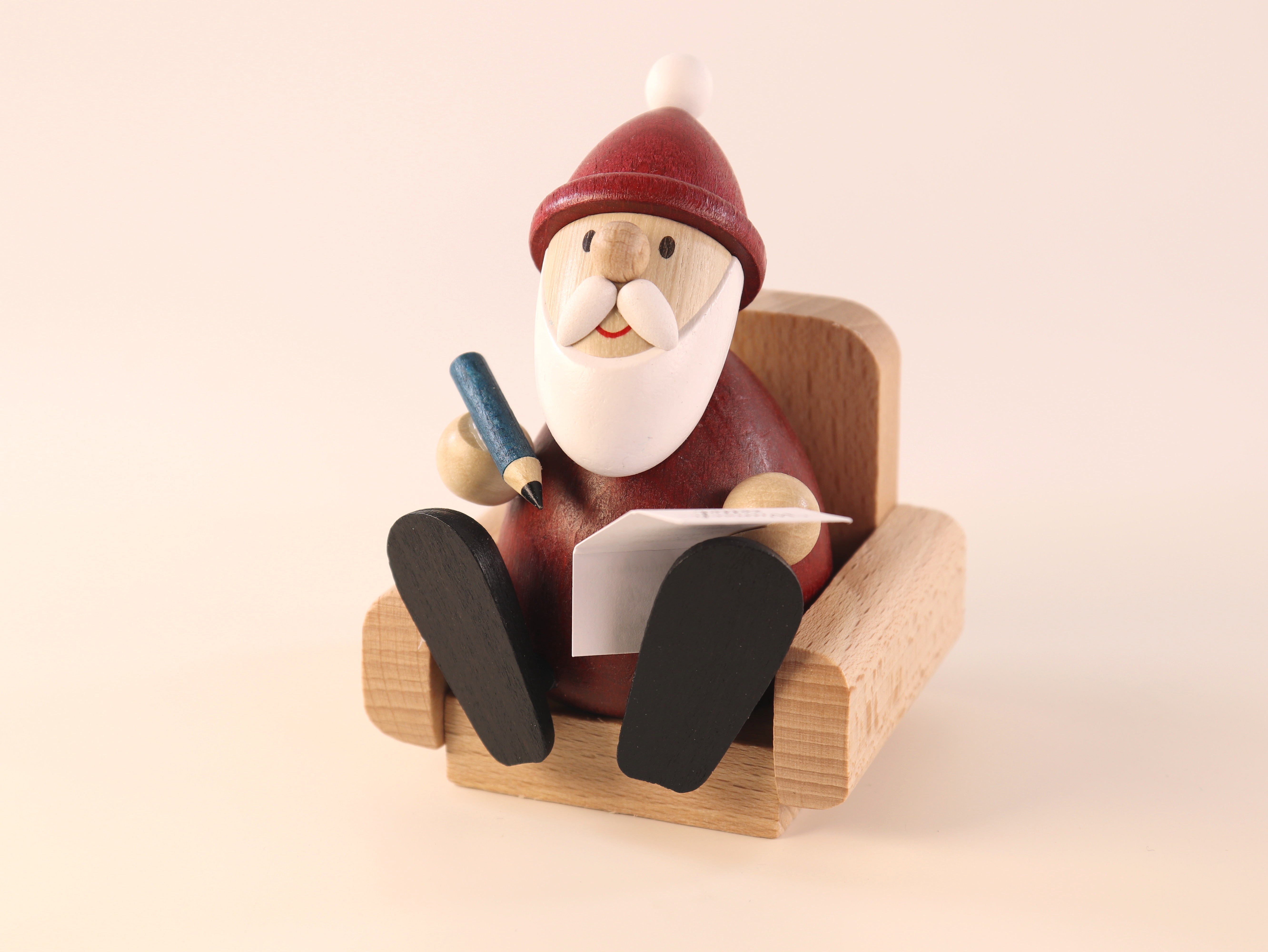 Weihnachtsmann im Sessel als Tisch-Schmuck