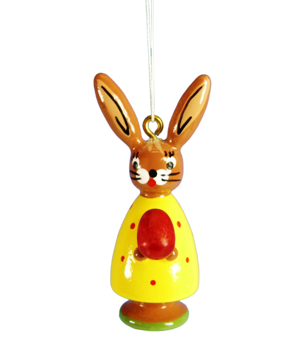 Hase hängend mit Ei gelb Hase hängend mit Ei gelb
